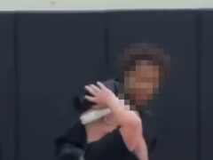 A student holds a homecoming crown on his head as he faces the classmate who gave it to him at Mahanoy Area High School