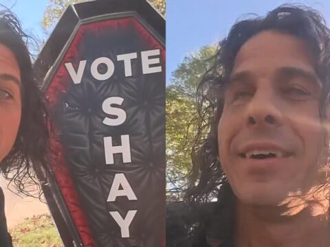 Arkansas mayoral candidate with his coffin campaign sign.